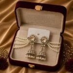 Gold Toned Pearl Chain Jhumka Earrings for Women - Image 4